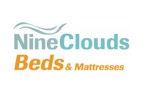 Is it important to lie down on the mattresses when visiting a store?