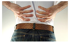 What can cause back pain when I sleep?